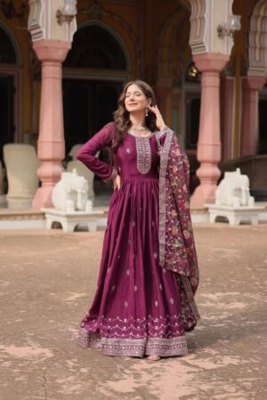 Made from premium Chinon fabric adorned with intricately embroidered sequins, this gown exudes a high-end appeal.