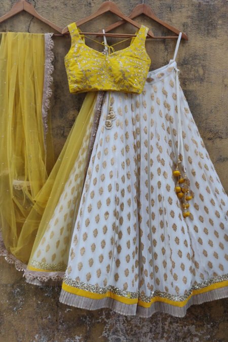 WHITE COLOR BANARASI SILK LEHENGA CHOLI WITH YELLOW NET DUPATTA
