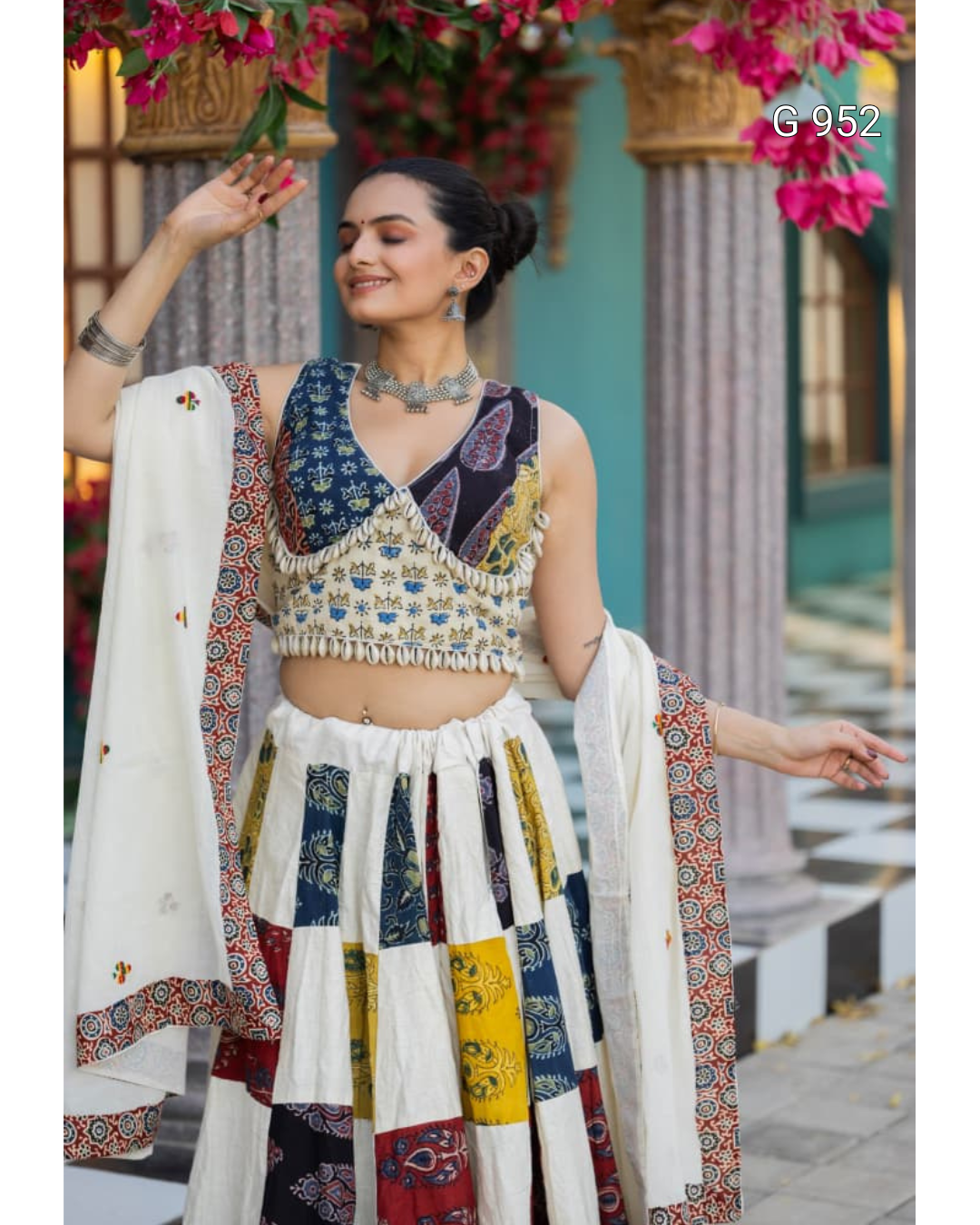 Navratri Ajrakh Hand Block Print Stitched Lehenga choli Set | Pure Khadi Cotton 6 PatchworkPrintLehengaCholiSetPairedwithSilverOxidizedJewelry OutdoorHeritageSettingPose
